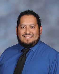 Staff member Andrew Uribe from 7524edb65f55