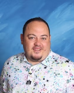 Staff member Riley Curtis from 7524edb65f55