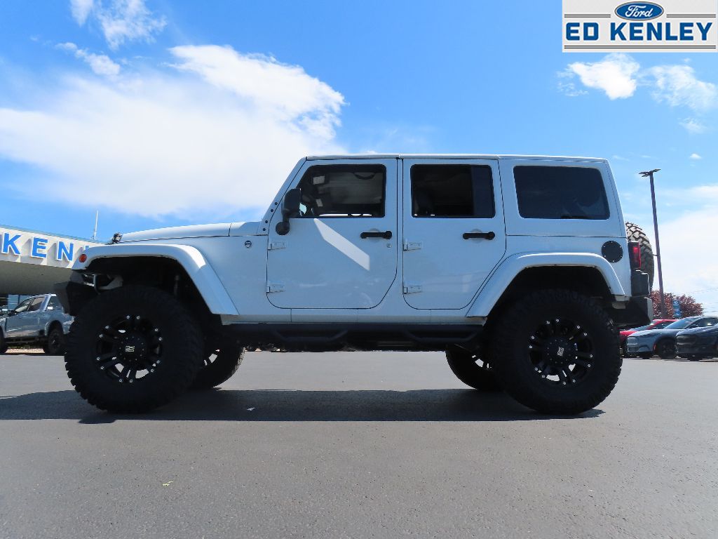 Used 2015 Jeep Wrangler Unlimited Sahara with VIN 1C4BJWEG2FL583533 for sale in Layton, UT