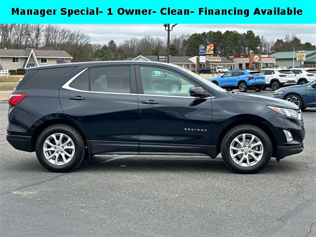 Used 2021 Chevrolet Equinox LT with VIN 3GNAXKEV0MS148249 for sale in Rockford, MI