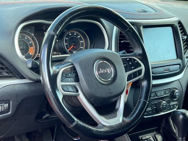 Used 2017 Jeep Cherokee Trailhawk with VIN 1C4PJMBS1HW648943 for sale in Rockford, MI