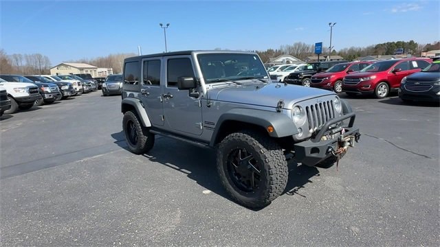 Used 2017 Jeep Wrangler Unlimited Sport with VIN 1C4BJWDG3HL526682 for sale in Rockford, MI