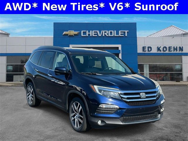 Used 2017 Honda Pilot Touring with VIN 5FNYF6H91HB081336 for sale in Rockford, MI