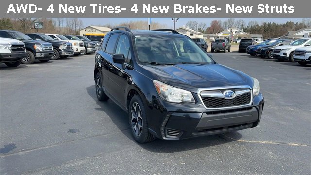 Used 2014 Subaru Forester XT Premium with VIN JF2SJGDC2EH421098 for sale in Rockford, MI
