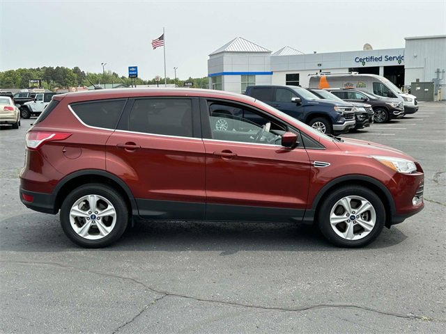 Used 2014 Ford Escape SE with VIN 1FMCU9GX4EUA52199 for sale in Rockford, MI