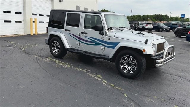 Used 2008 Jeep Wrangler Unlimited Sahara with VIN 1J4GA59148L583908 for sale in Rockford, MI
