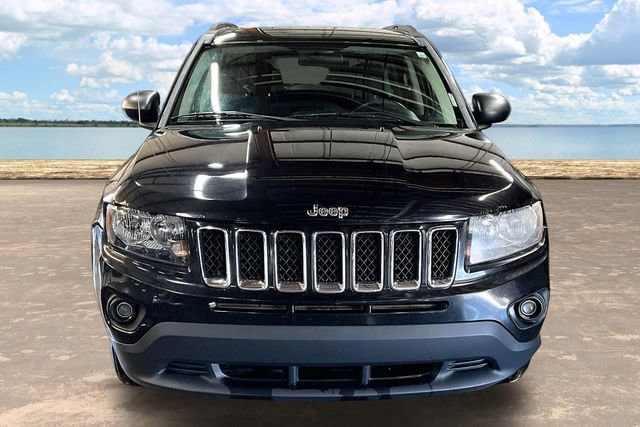 Used 2014 Jeep Compass Sport with VIN 1C4NJCBA0ED619286 for sale in Rockford, MI