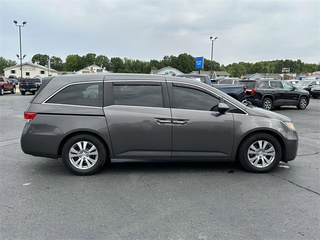 Used 2015 Honda Odyssey EX-L with VIN 5FNRL5H65FB127048 for sale in Rockford, MI