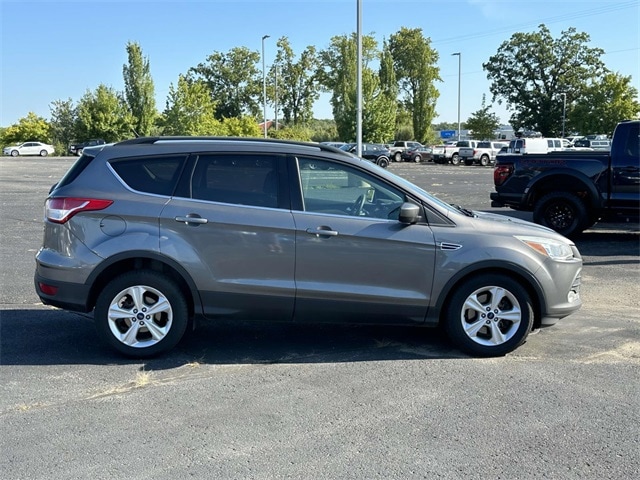 Used 2014 Ford Escape SE with VIN 1FMCU9G90EUC25881 for sale in Greenville, MI