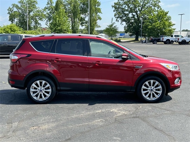 Used 2017 Ford Escape Titanium with VIN 1FMCU9JD1HUF06654 for sale in Greenville, MI