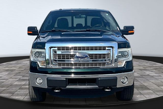 Used 2014 Ford F-150 XLT with VIN 1FTFX1ETXEFC67701 for sale in Rockford, MI