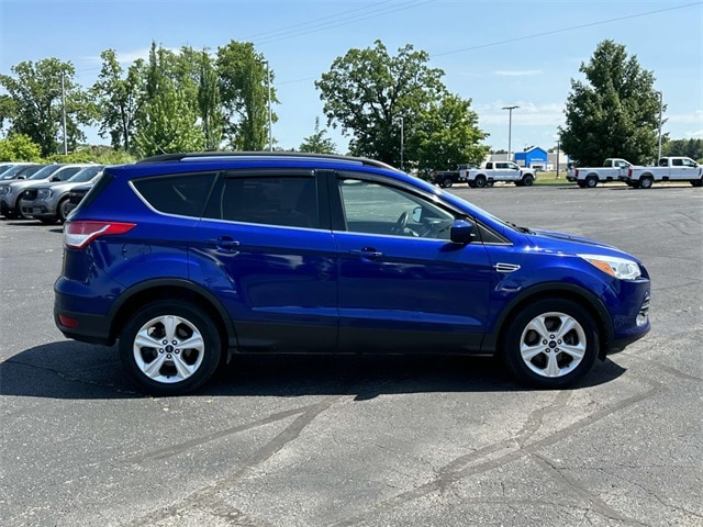 Used 2016 Ford Escape SE with VIN 1FMCU9GX1GUA52387 for sale in Greenville, MI