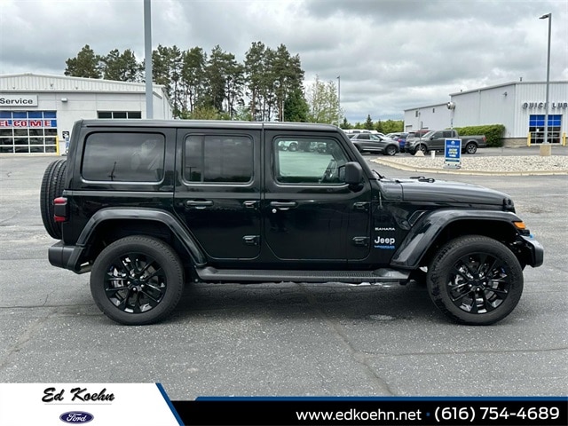 Used 2022 Jeep Wrangler Unlimited Sahara 4XE with VIN 1C4JJXP69NW276072 for sale in Greenville, MI