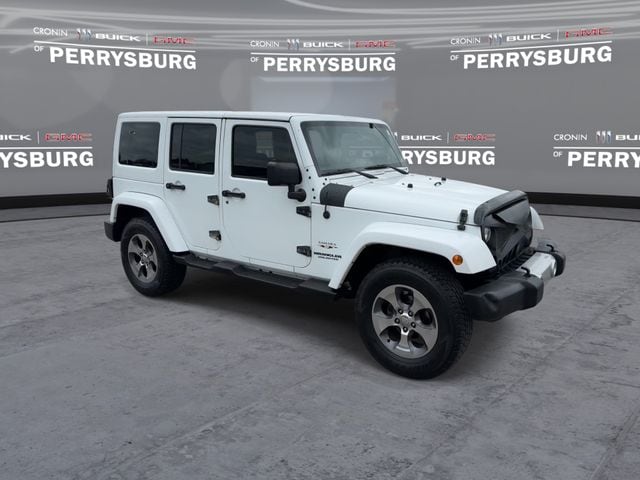 Used 2016 Jeep Wrangler Unlimited Sahara with VIN 1C4HJWEG3GL339062 for sale in Perrysburg, OH