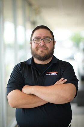 Staff member Eric Scott from ID_8bd22b33a1e8