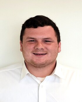 Staff member Cameron Saxton from a718981c265f