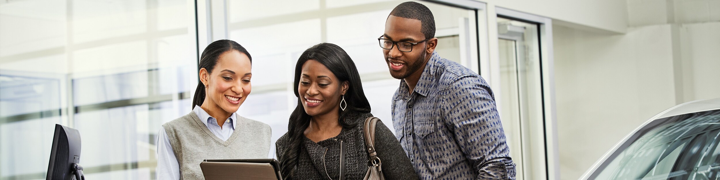 Couple speaking with a seller