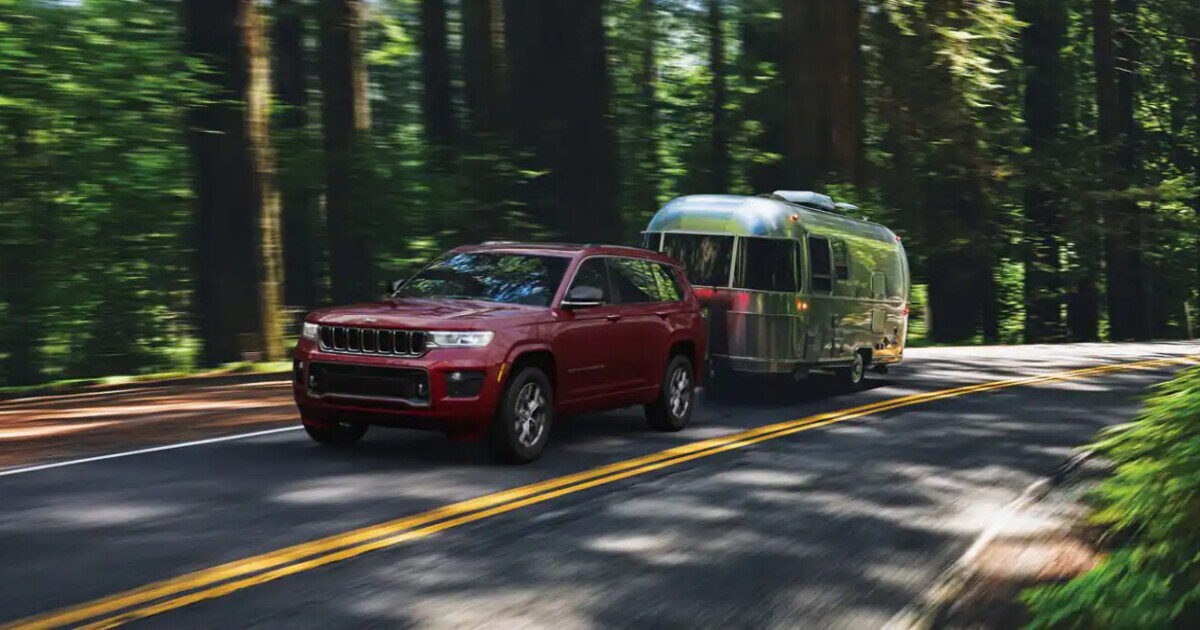 2023 Jeep Grand Cherokee towing a camper