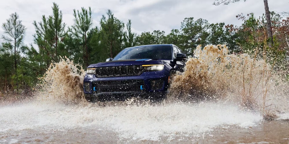 2024 Jeep Grand Cherokee driving through water