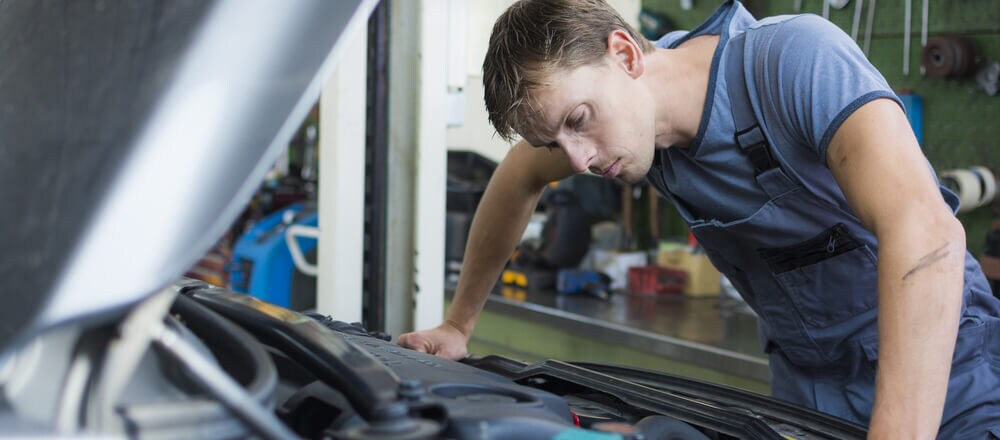 Mechanic checking car.jpg