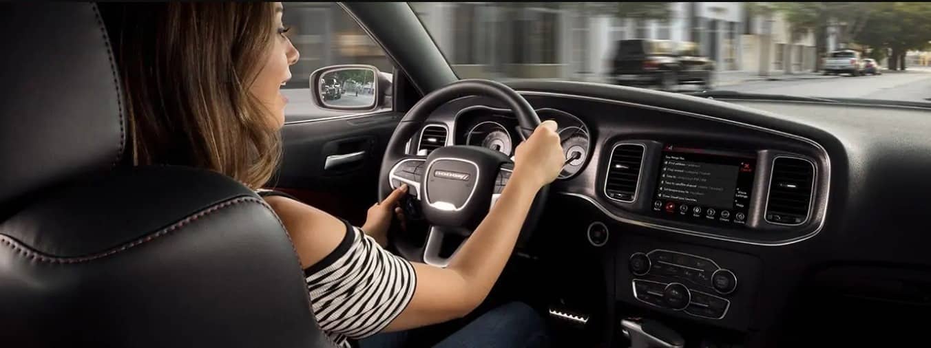 woman drives 2019 Charger