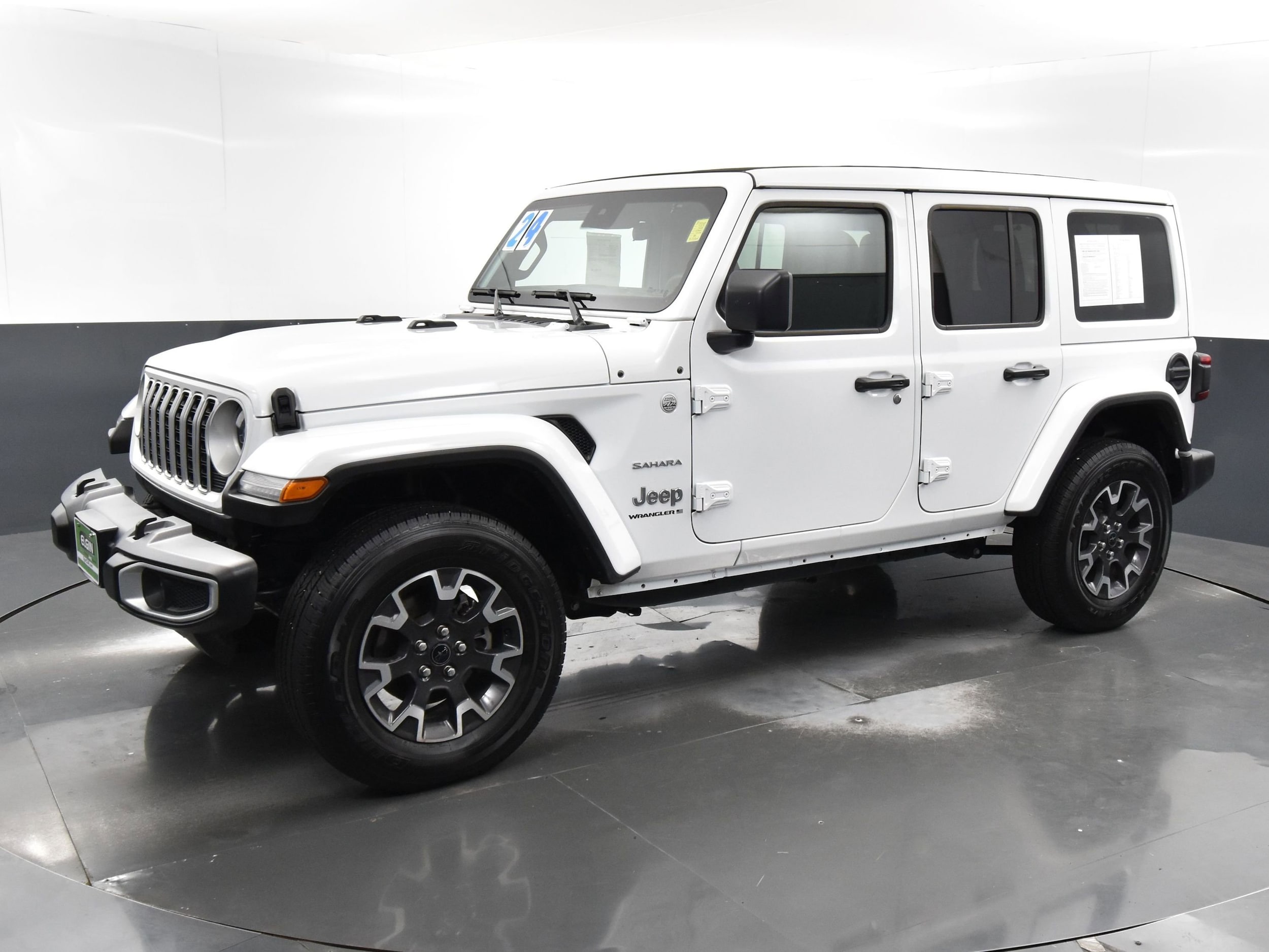 Used 2024 Jeep Wrangler 4-Door Sahara with VIN 1C4PJXENXRW136543 for sale in Streamwood, IL