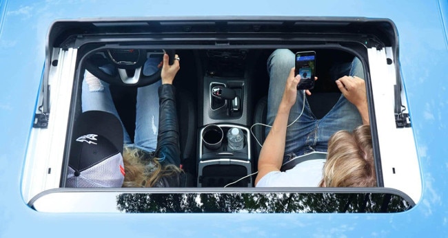 driver and passenger in dodge charger.
