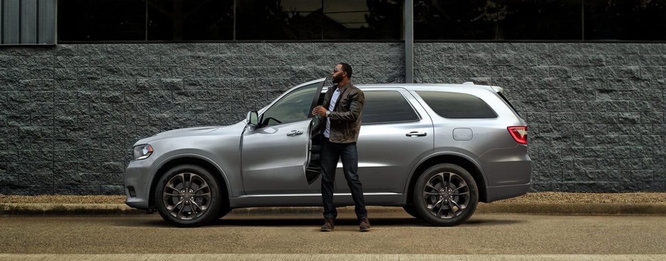 man gets out 2019 Dodge Durango