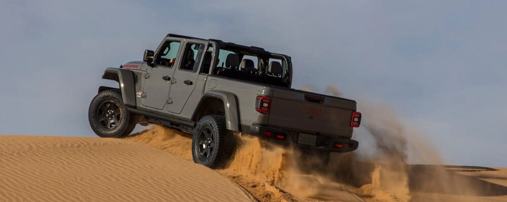 Jeep Gladiator driving through the desert
