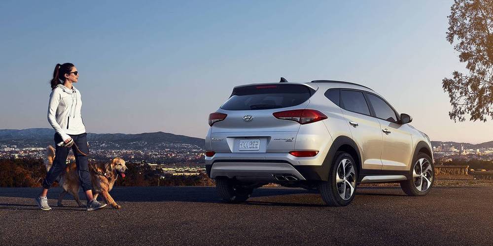 2018 Hyundai Tucson Woman Walking Dog.jpg