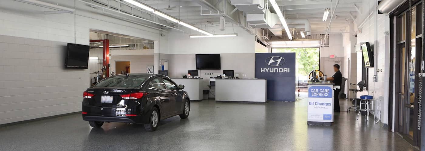 Hyundai sedan in service bay for spring maintenance