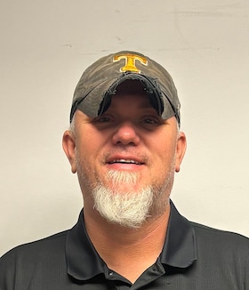 Staff member Tom Osborne  from ID_e492db