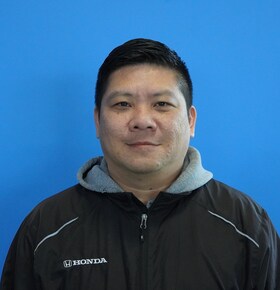 Staff member Mike Sy from 53b56cc19173