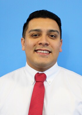 Staff member Alex Khan from 4d4051ee3e9f