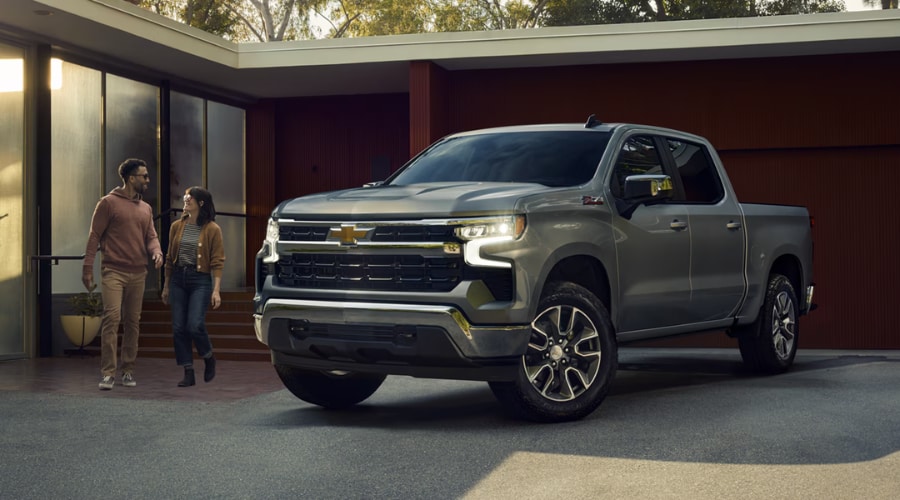 Slate gray 2026 Chevy Silverado 1500 Z71 parked at a South Jersey home, ideal for everyday family commutes and hands-free highway cruising across Burlington County.