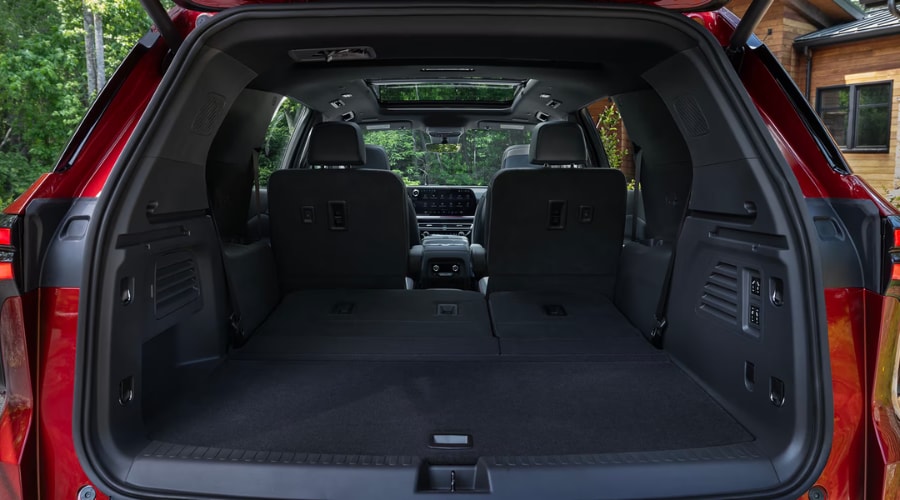 Interior look inside a 2026 Chevy Traverse in Marlton showing third-row seating flat down for cargo storage at Elkins Chevrolet