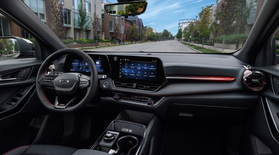 Interior console area of a 2026 Chevrolet Equinox RS in Marlton displaying wireless smartphone app integration on screen