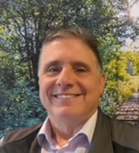 Staff member Vincent Asermely from ID_f49f94f9ea15