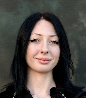 Staff member Maggie Travis  from ID_c558663113ca