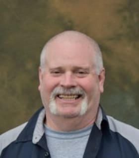 Staff member Tim Lenihan from ID_553fc4c1f2b2