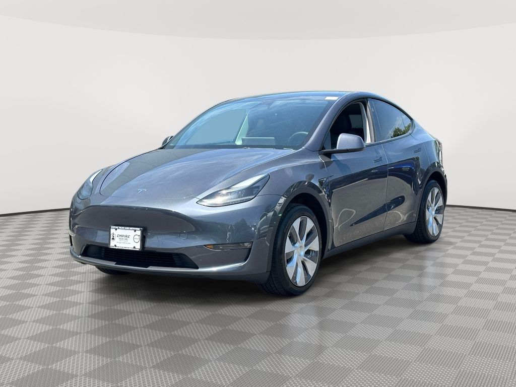 Used 2023 Tesla Model Y Base with VIN 7SAYGDED9PF932388 for sale in Saint James, NY