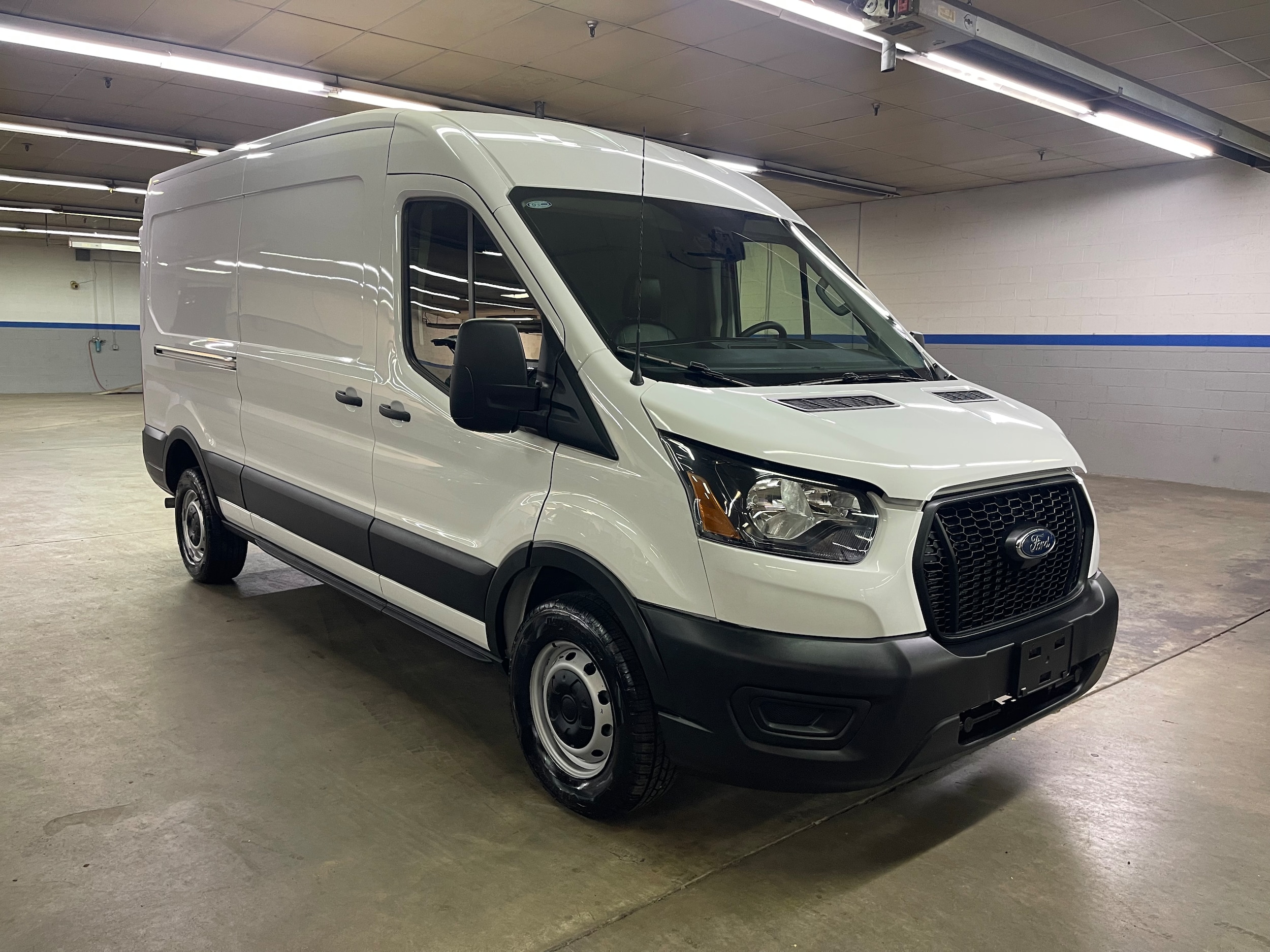 2025 Ford Transit 250 Med Roof 148 WB's photo