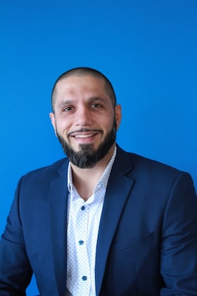 Staff member Sid Azizi from ID_270b3c