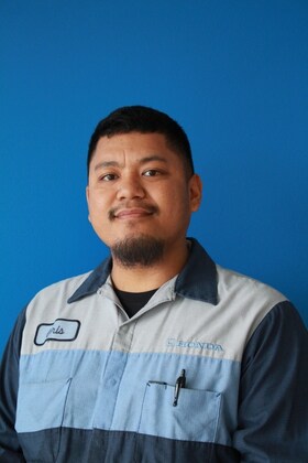Staff member Christopher Saquinton Madarazo from ID_313d0e