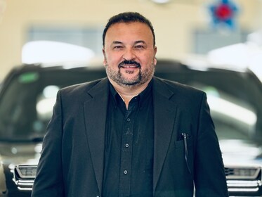 Staff member Tariq Aziz from ID_351981