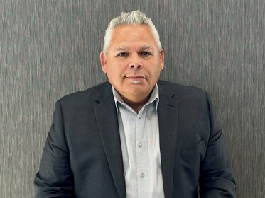 Staff member Sean Holguin from ID_7ea7e24ecca5