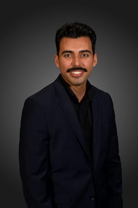 Staff member Gage Baca-Romero from ID_9c1a2b