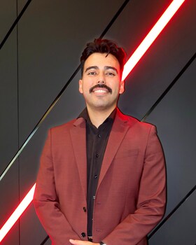 Staff member Gage Baca-Romero from ID_8e2cf4