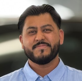 Staff member Edgar Rico from ID_053599