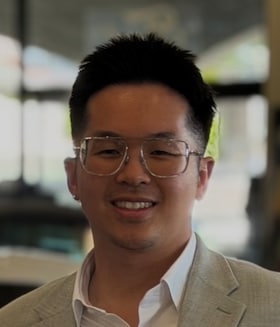 Staff member Justin Cao from ID_c4fe31